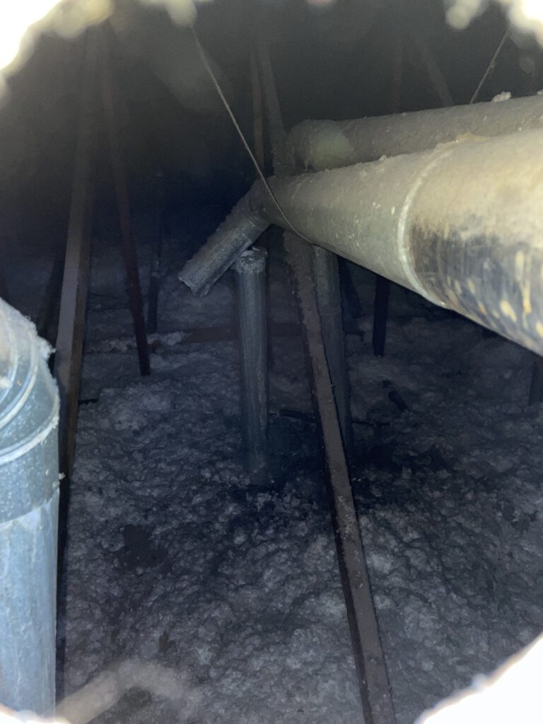 Dryer vent duct system during cleaning in Knollwood, Durham home